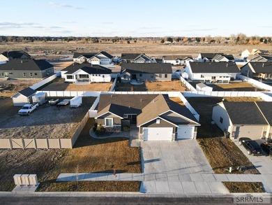This well-maintained, move-in-ready home offers 6 bedrooms and 3 on Sage Lakes Municipal Golf Course in Idaho - for sale on GolfHomes.com, golf home, golf lot