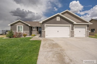 This well-maintained, move-in-ready home offers 6 bedrooms and 3 on Sage Lakes Municipal Golf Course in Idaho - for sale on GolfHomes.com, golf home, golf lot