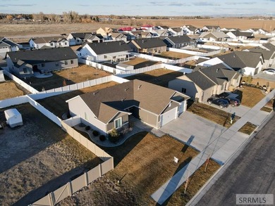 This well-maintained, move-in-ready home offers 6 bedrooms and 3 on Sage Lakes Municipal Golf Course in Idaho - for sale on GolfHomes.com, golf home, golf lot