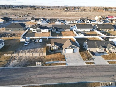 This well-maintained, move-in-ready home offers 6 bedrooms and 3 on Sage Lakes Municipal Golf Course in Idaho - for sale on GolfHomes.com, golf home, golf lot