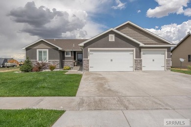 This well-maintained, move-in-ready home offers 6 bedrooms and 3 on Sage Lakes Municipal Golf Course in Idaho - for sale on GolfHomes.com, golf home, golf lot