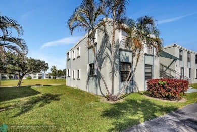 Well-maintained 2-bedroom, 2-bathroom unit located in Margate on Oriole Golf and Tennis Club in Florida - for sale on GolfHomes.com, golf home, golf lot