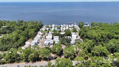 Looking to build your dream home?  Welcome to this beautiful lot on Peninsula Golf and Racquet Club in Alabama - for sale on GolfHomes.com, golf home, golf lot