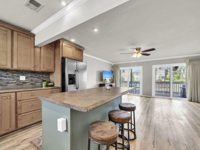 Welcome to your cozy coastal cottage on the canal at Sandpiper on Sandpiper Cove Golf Course in Florida - for sale on GolfHomes.com, golf home, golf lot
