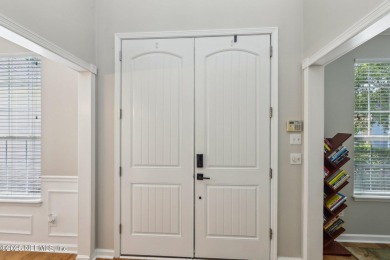 Welcome to your dream home in the prestigious gated community of on Cimarrone Golf and Country Club in Florida - for sale on GolfHomes.com, golf home, golf lot