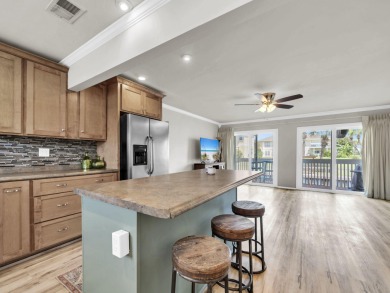 Welcome to your cozy coastal cottage on the canal at Sandpiper on Sandpiper Cove Golf Course in Florida - for sale on GolfHomes.com, golf home, golf lot