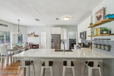 Welcome to your dream home in the prestigious gated community of on Cimarrone Golf and Country Club in Florida - for sale on GolfHomes.com, golf home, golf lot