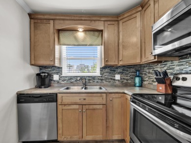 Welcome to your cozy coastal cottage on the canal at Sandpiper on Sandpiper Cove Golf Course in Florida - for sale on GolfHomes.com, golf home, golf lot