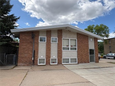 Well-maintained office building ideal for various professional on Columbia Golf Club in Minnesota - for sale on GolfHomes.com, golf home, golf lot