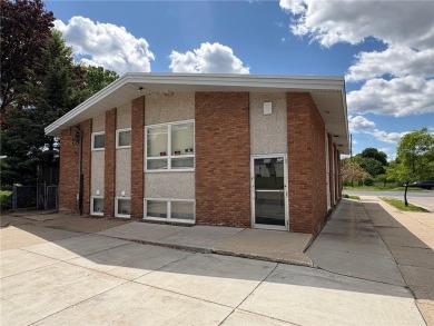 Well-maintained office building ideal for various professional on Columbia Golf Club in Minnesota - for sale on GolfHomes.com, golf home, golf lot