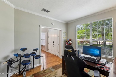 Welcome to your dream home in the prestigious gated community of on Cimarrone Golf and Country Club in Florida - for sale on GolfHomes.com, golf home, golf lot