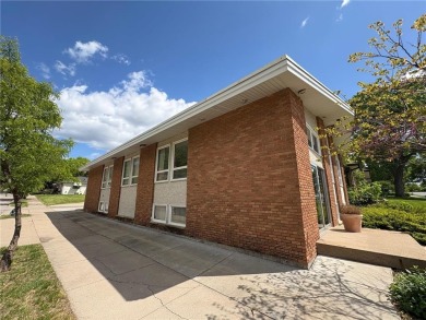 Well-maintained office building ideal for various professional on Columbia Golf Club in Minnesota - for sale on GolfHomes.com, golf home, golf lot