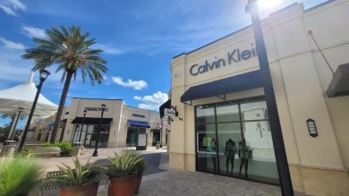Welcome to your dream condo in the desirable Lands of the on The President Country Club in Florida - for sale on GolfHomes.com, golf home, golf lot