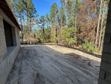 ALMOST READY-Wanting A Wooded View-Privacy? 1 of only 4 lots on Southern Hills Plantation Club in Florida - for sale on GolfHomes.com, golf home, golf lot