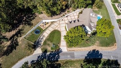 The Perfect Blend of Convenience, Seclusion, and Luxury Living on Osage National Golf Club in Missouri - for sale on GolfHomes.com, golf home, golf lot