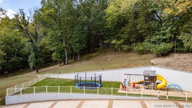 The Perfect Blend of Convenience, Seclusion, and Luxury Living on Osage National Golf Club in Missouri - for sale on GolfHomes.com, golf home, golf lot