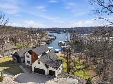 Exceptional vacant lot with beautiful direct water views located on The Club At Porto Cima in Missouri - for sale on GolfHomes.com, golf home, golf lot