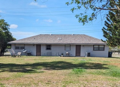 WELL KEPT DUPLEX WITH BRAND NEW ROOF LOCATED ON BEAUTIFUL HALF on Gator Trace Golf and Country Club in Florida - for sale on GolfHomes.com, golf home, golf lot