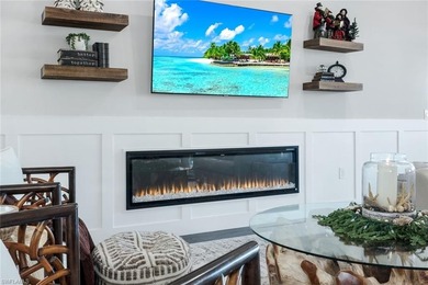 Welcome to elevated living in The Quarry of Naples. This on The Golf Lodge At the Quarry in Florida - for sale on GolfHomes.com, golf home, golf lot