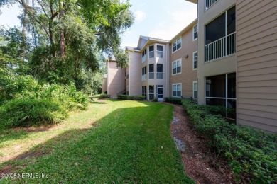 if you've ever wanted your own personal treehouse - this condo on Windsor Parke Golf Club in Florida - for sale on GolfHomes.com, golf home, golf lot