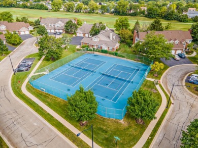 Welcome to this light and bright 2nd-floor end unit in the on The Golf Club of Illinois in Illinois - for sale on GolfHomes.com, golf home, golf lot