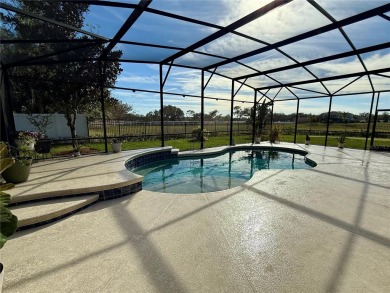 Enjoy this luxurious 5 bedroom, 3.5 bathroom home with a on Rock Springs Ridge Golf Club in Florida - for sale on GolfHomes.com, golf home, golf lot