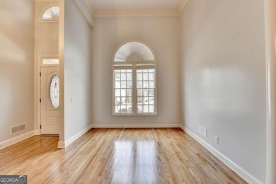 Welcome Home to this beautiful, easy-living residence perfectly on Hampton Golf Village in Georgia - for sale on GolfHomes.com, golf home, golf lot