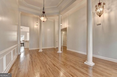 Welcome Home to this beautiful, easy-living residence perfectly on Hampton Golf Village in Georgia - for sale on GolfHomes.com, golf home, golf lot