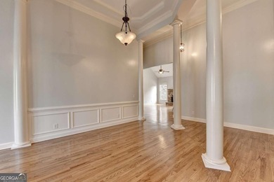 Welcome Home to this beautiful, easy-living residence perfectly on Hampton Golf Village in Georgia - for sale on GolfHomes.com, golf home, golf lot