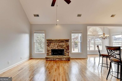 Welcome Home to this beautiful, easy-living residence perfectly on Hampton Golf Village in Georgia - for sale on GolfHomes.com, golf home, golf lot