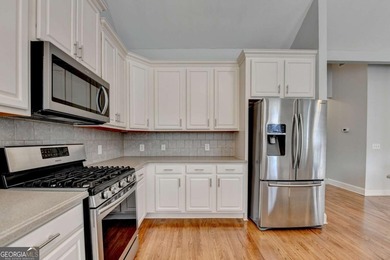 Welcome Home to this beautiful, easy-living residence perfectly on Hampton Golf Village in Georgia - for sale on GolfHomes.com, golf home, golf lot