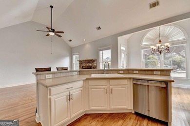 Welcome Home to this beautiful, easy-living residence perfectly on Hampton Golf Village in Georgia - for sale on GolfHomes.com, golf home, golf lot