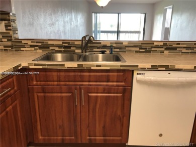 Relaxing Lake view.2 Bed 2 Bath , Freshly painted, recently on Fontainebleau Golf Course in Florida - for sale on GolfHomes.com, golf home, golf lot