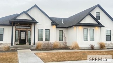 Don't miss this custom, craftsman-style 2020 Parade of Copper on Sand Creek Golf Course in Idaho - for sale on GolfHomes.com, golf home, golf lot