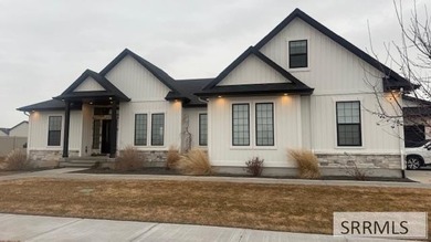 Don't miss this custom, craftsman-style 2020 Parade of Copper on Sand Creek Golf Course in Idaho - for sale on GolfHomes.com, golf home, golf lot
