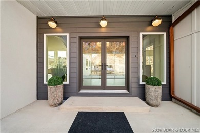 Experience luxury in this stunning 5,500 sq ft home that blends on The Club At Porto Cima in Missouri - for sale on GolfHomes.com, golf home, golf lot