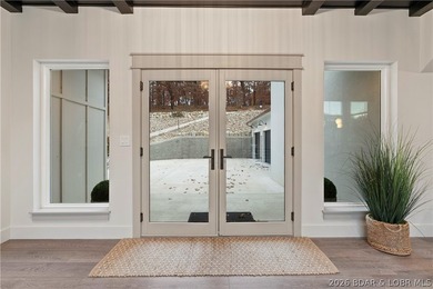 Experience luxury in this stunning 5,500 sq ft home that blends on The Club At Porto Cima in Missouri - for sale on GolfHomes.com, golf home, golf lot