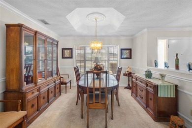 Welcome to this beautifully maintained waterfront home located on Jacaranda West Country Club in Florida - for sale on GolfHomes.com, golf home, golf lot