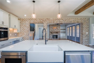 Experience luxury when viewing 2403 Warriors Path. This home is on Cobbs Glen Country Club in South Carolina - for sale on GolfHomes.com, golf home, golf lot