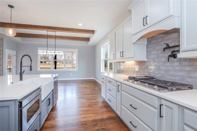 Experience luxury when viewing 2403 Warriors Path. This home is on Cobbs Glen Country Club in South Carolina - for sale on GolfHomes.com, golf home, golf lot