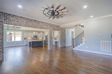 Experience luxury when viewing 2403 Warriors Path. This home is on Cobbs Glen Country Club in South Carolina - for sale on GolfHomes.com, golf home, golf lot