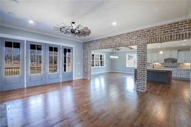 Experience luxury when viewing 2403 Warriors Path. This home is on Cobbs Glen Country Club in South Carolina - for sale on GolfHomes.com, golf home, golf lot