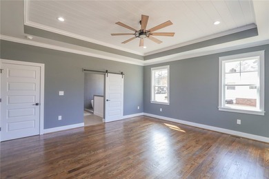 Experience luxury when viewing 2403 Warriors Path. This home is on Cobbs Glen Country Club in South Carolina - for sale on GolfHomes.com, golf home, golf lot