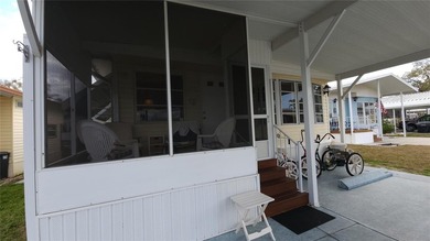 TWO BEDROOM, ONE BATH MOBILE HOME IN ACTIVE 55+ COMMUNITY! This on River Run Golf Links in Florida - for sale on GolfHomes.com, golf home, golf lot