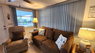 TWO BEDROOM, ONE BATH MOBILE HOME IN ACTIVE 55+ COMMUNITY! This on River Run Golf Links in Florida - for sale on GolfHomes.com, golf home, golf lot