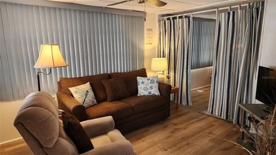 TWO BEDROOM, ONE BATH MOBILE HOME IN ACTIVE 55+ COMMUNITY! This on River Run Golf Links in Florida - for sale on GolfHomes.com, golf home, golf lot