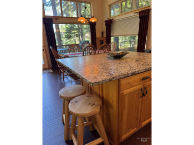 Your cabin in the woods sits on *Cedar 5* of the McCall Golf on McCall Municipal Golf Course in Idaho - for sale on GolfHomes.com, golf home, golf lot