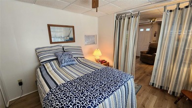 TWO BEDROOM, ONE BATH MOBILE HOME IN ACTIVE 55+ COMMUNITY! This on River Run Golf Links in Florida - for sale on GolfHomes.com, golf home, golf lot