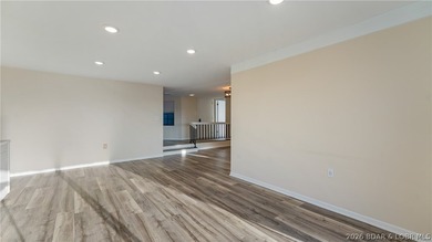 Tastefully updated and beautifully decorated condo at the on Seasons Ridge At Four Seasons in Missouri - for sale on GolfHomes.com, golf home, golf lot