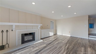 Tastefully updated and beautifully decorated condo at the on Seasons Ridge At Four Seasons in Missouri - for sale on GolfHomes.com, golf home, golf lot